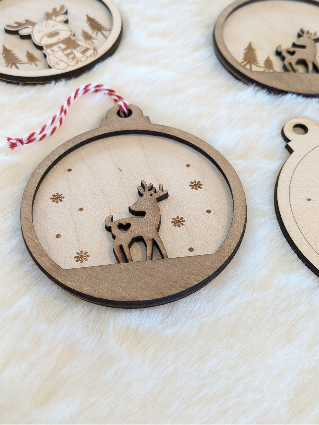 Boule de noël "Petit renne aux flocons"